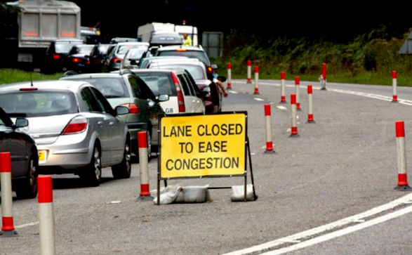 Lane closed to ease congestion